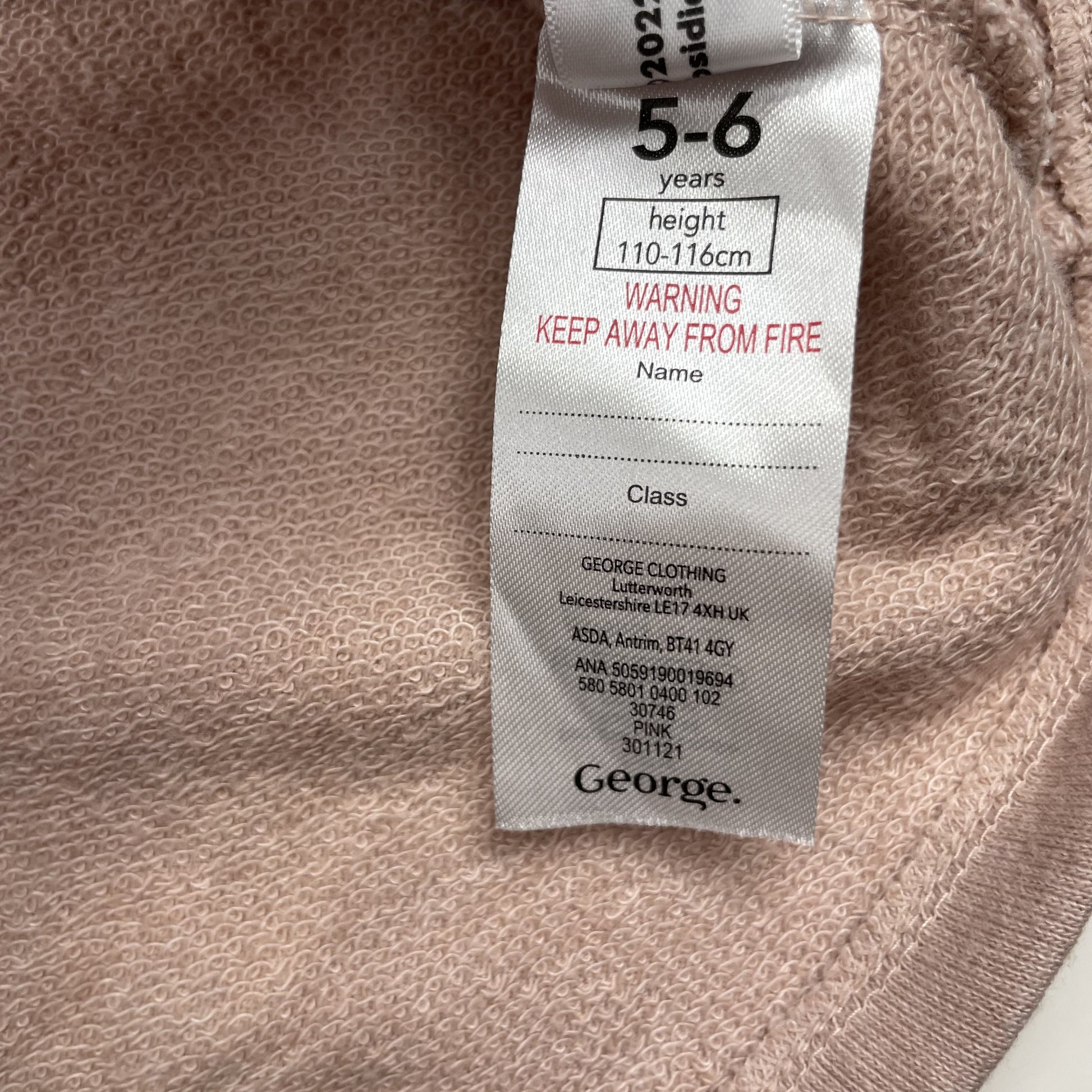 Rosa Kleid mit Tiermotiven, verstellbaren Trägern und Globus-Slogan. – label