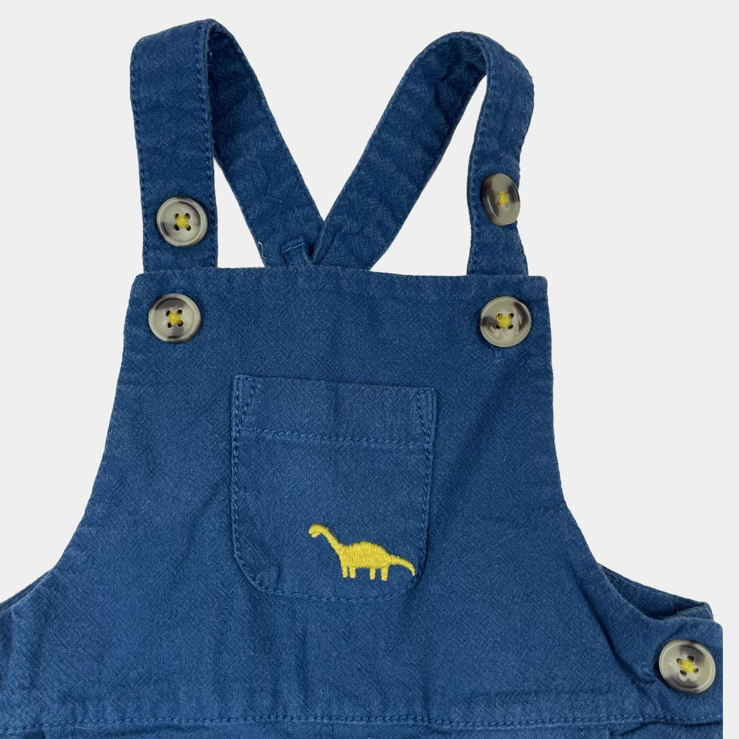 Blauer Overall mit Dinosaurier-Stickerei und Knöpfen – fabric