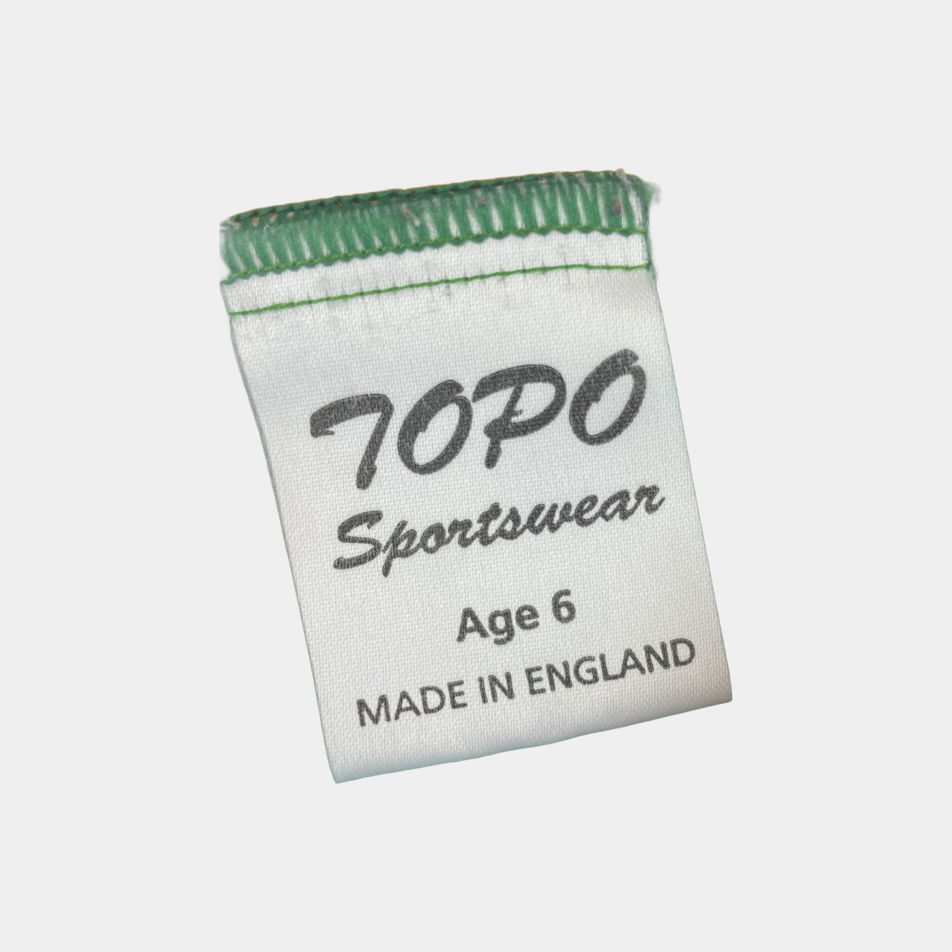 Grüner und gelber TOPO Fleece-Pullover für Kinder, Alter 6 Jahre – label