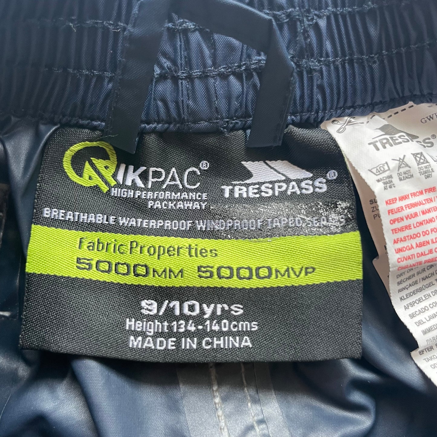 Dunkelblaue Trespass-Regenhose für Kinder, 9/10 Jahre – label