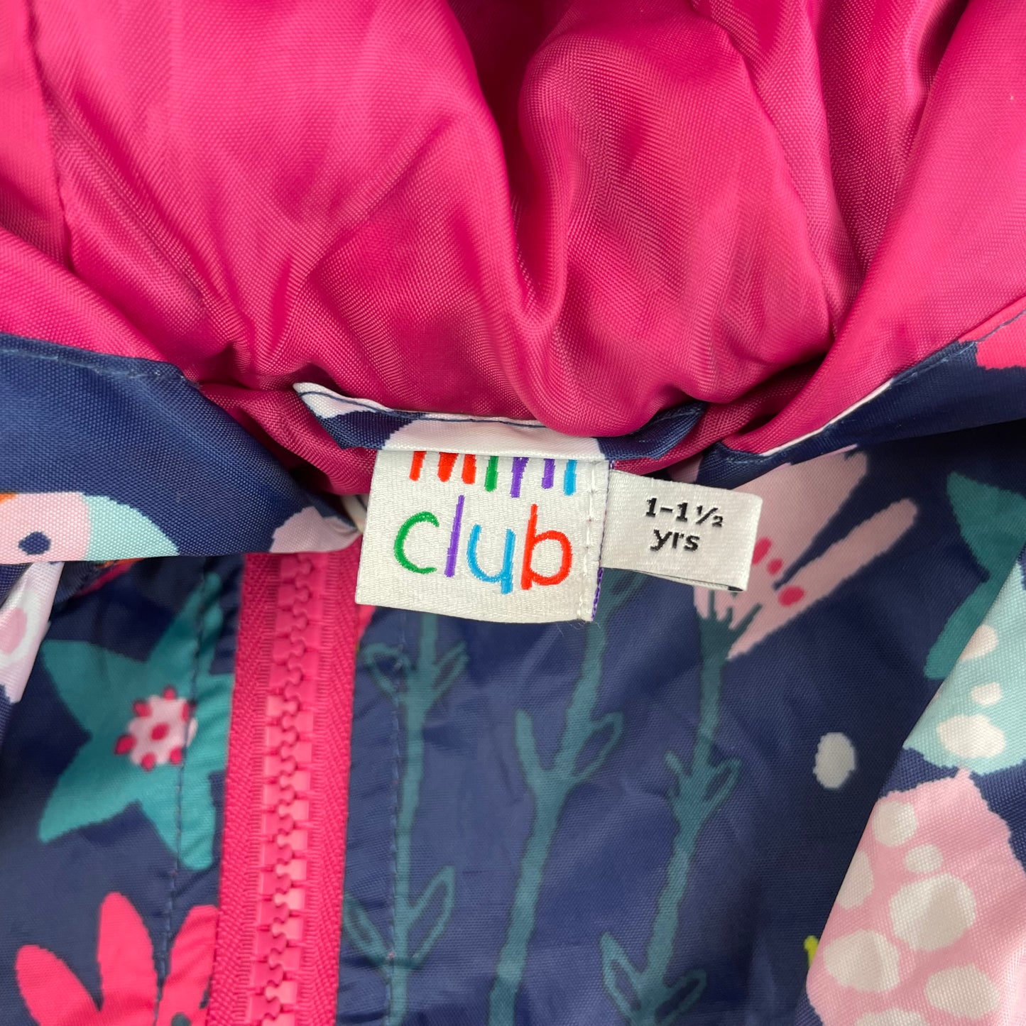 Regenoverall für Kinder mit buntem Blumenmuster und Kapuze – label