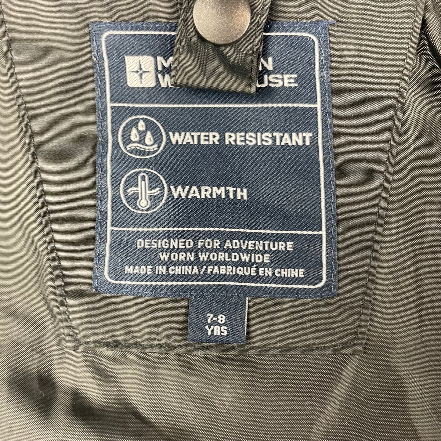 Schwarze Regenjacke mit Kapuze für Kinder – tag