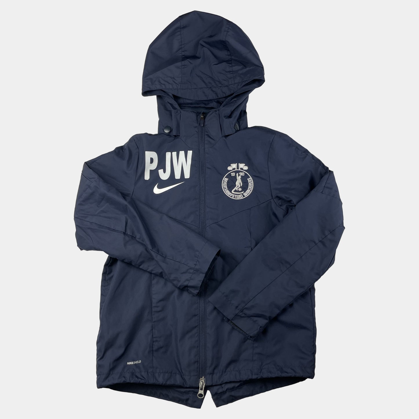 Dunkelblaue Regenjacke mit Kapuze von Nike für Kinder – flatlay