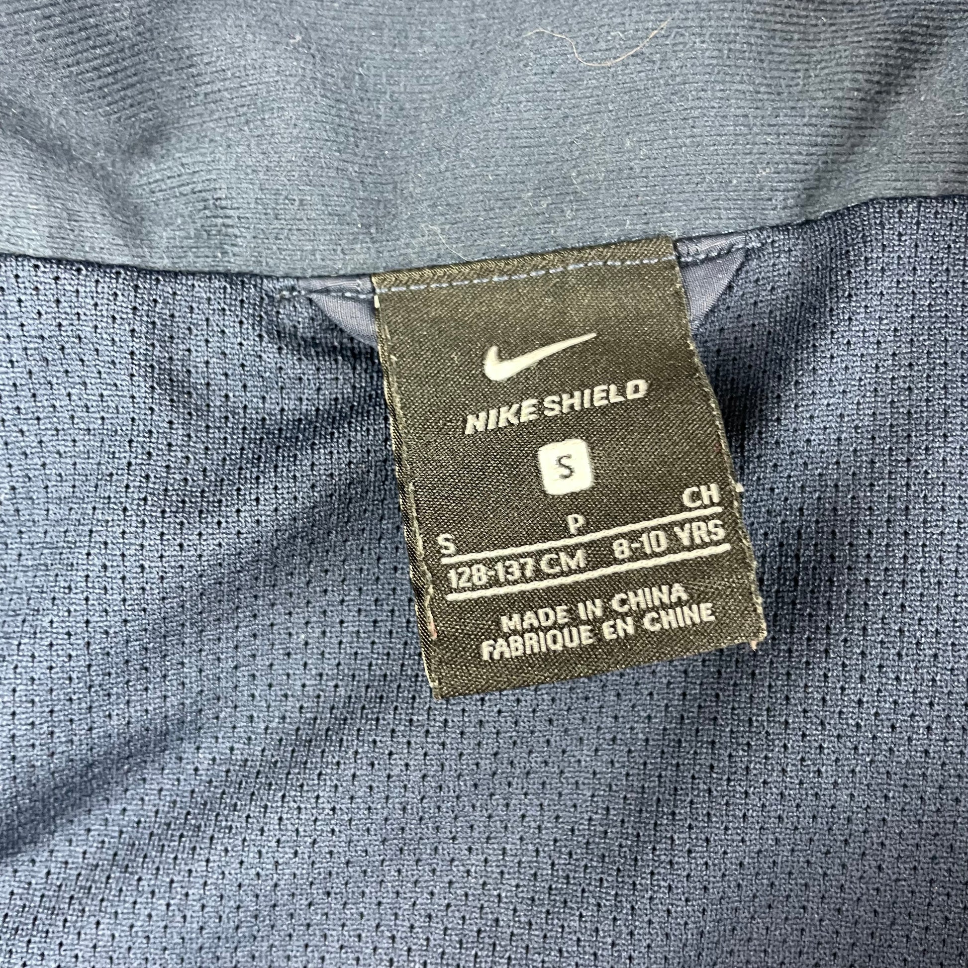 Dunkelblaue Regenjacke mit Kapuze von Nike für Kinder – label