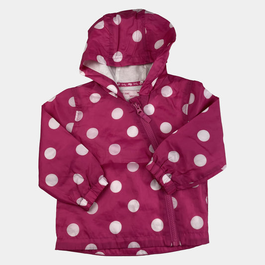 Pinkfarbene Regenjacke mit weißen Punkten und Kapuze von Tu für Kinder, Größe 9-12 Monate. – front