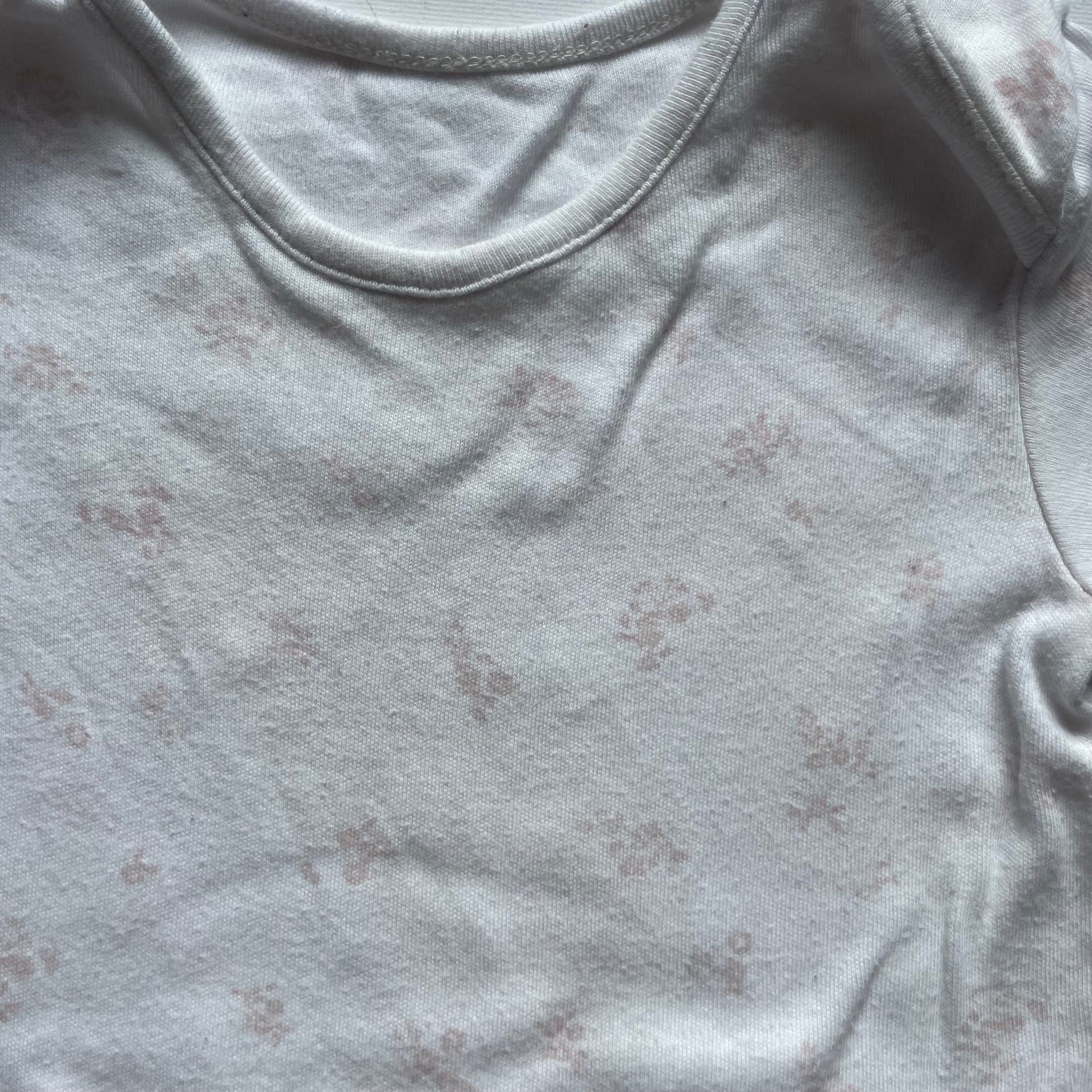 Weißer Baumwolle-Body mit kurzen Ärmeln – detail