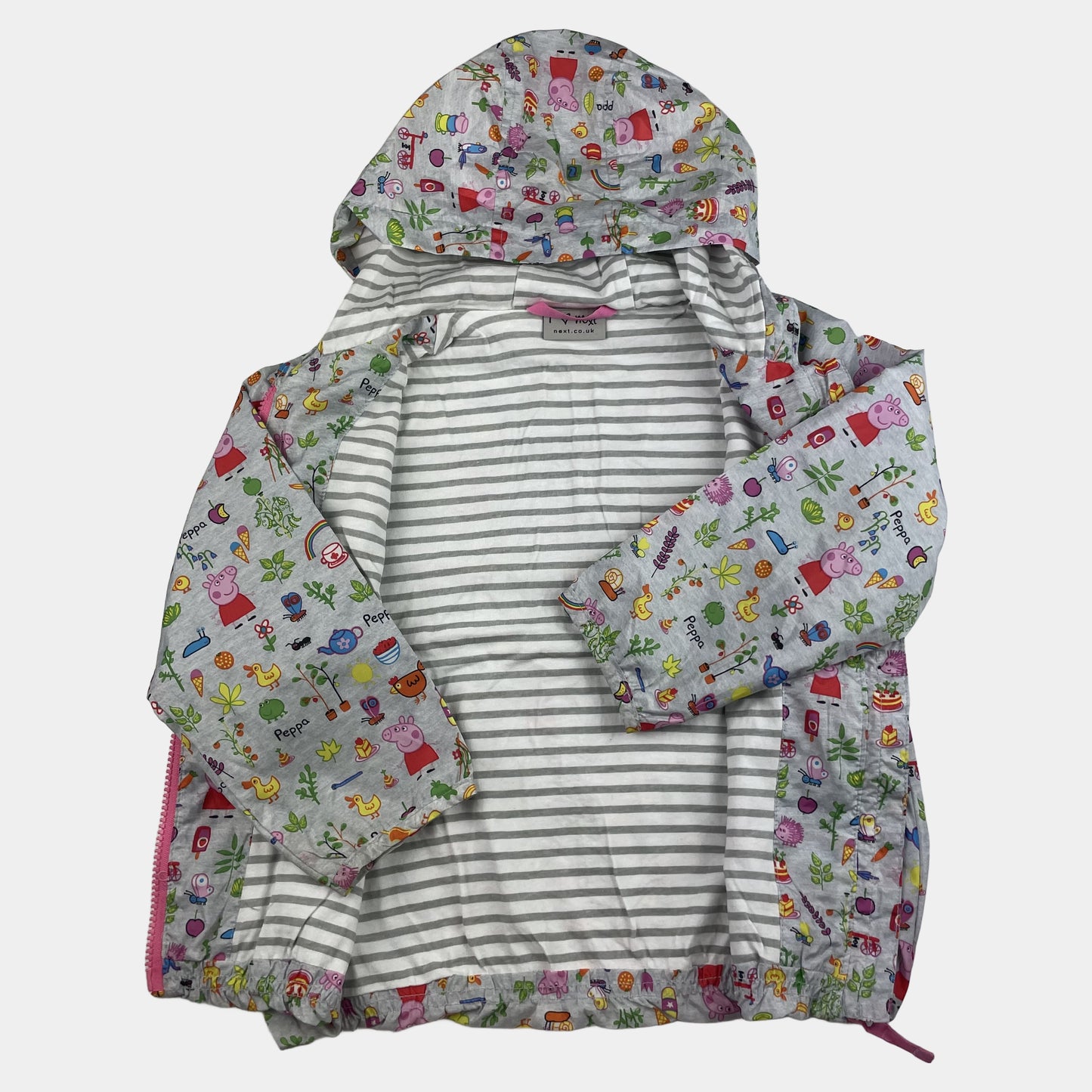 Mehrfarbige Regenjacke mit Kapuze und buntem Motiv – inside