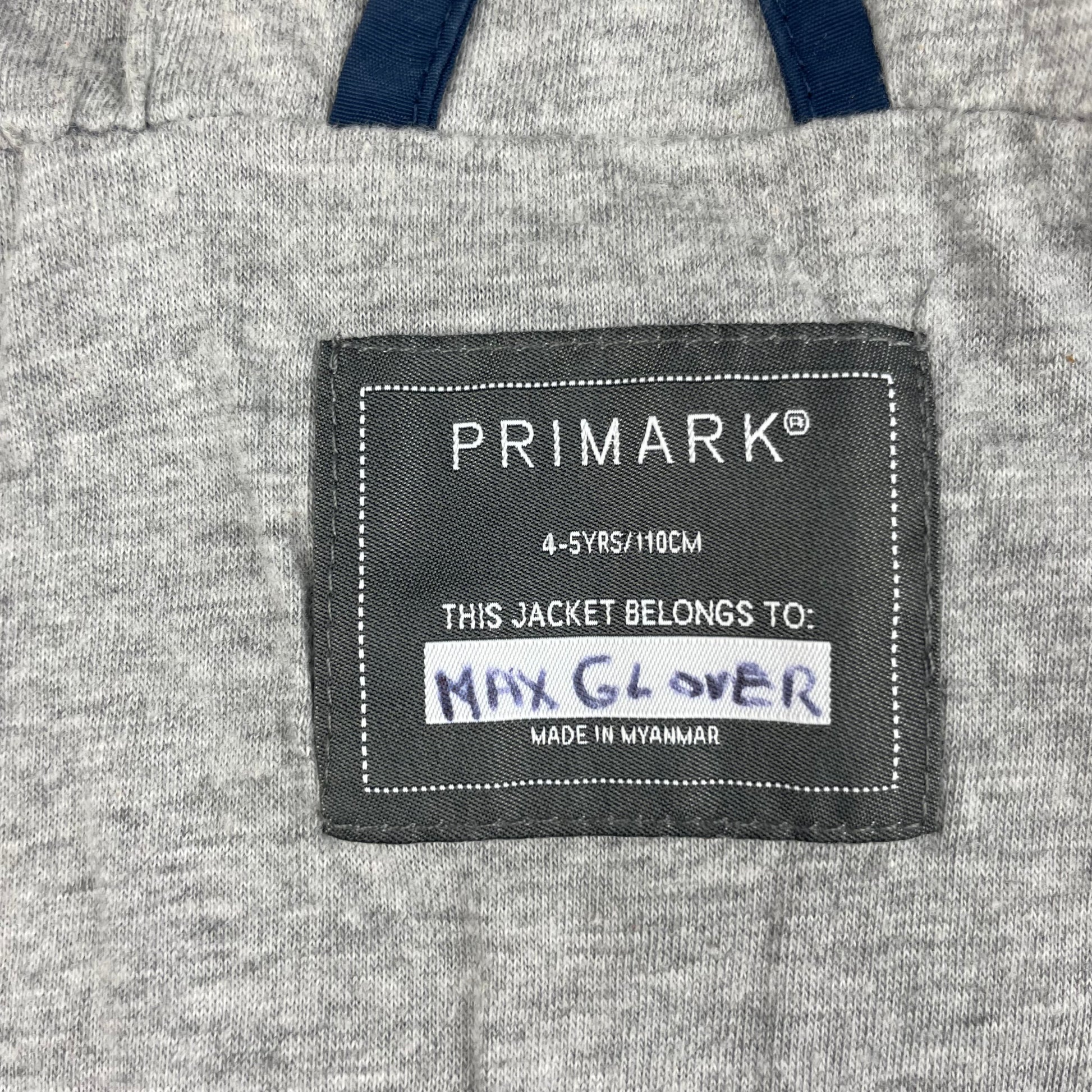 Blaue Kinderjacke mit Kapuze und Reißverschlüssen – label