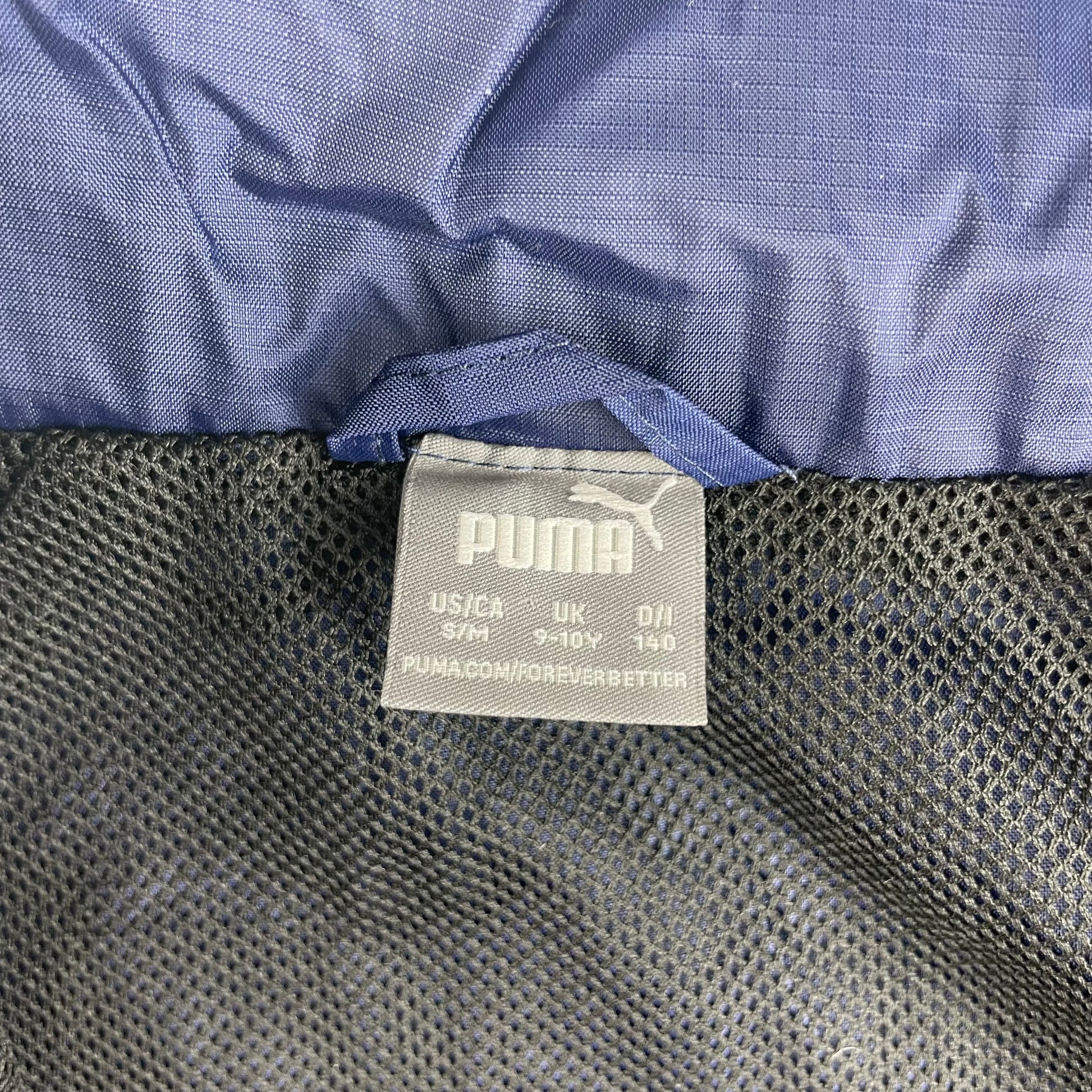 Blaue Puma Sportjacke für Kinder mit Vereinslogo und Reißverschluss, Größe 9-10 Jahre – tag