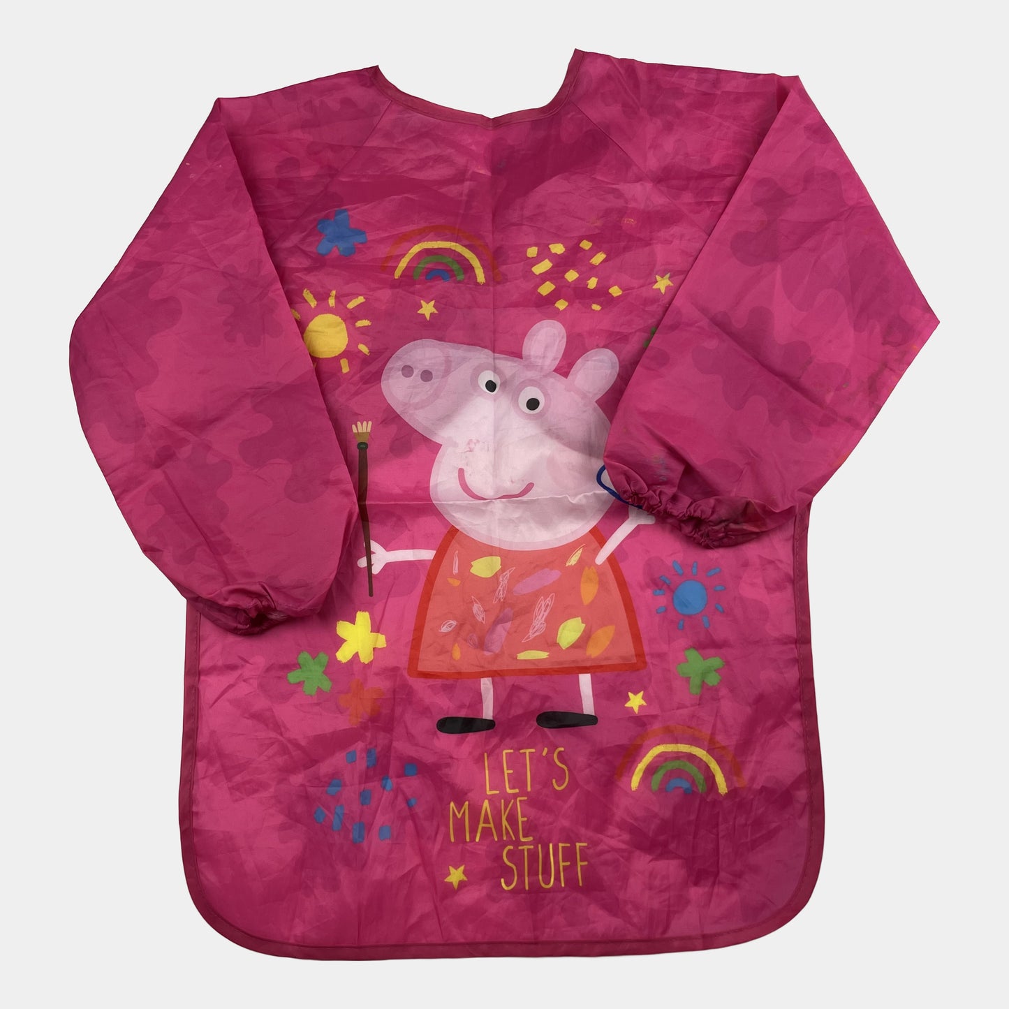 Rosa Malkittel mit Peppa Pig Motiv und "Let's Make Stuff" Aufdruck. – front