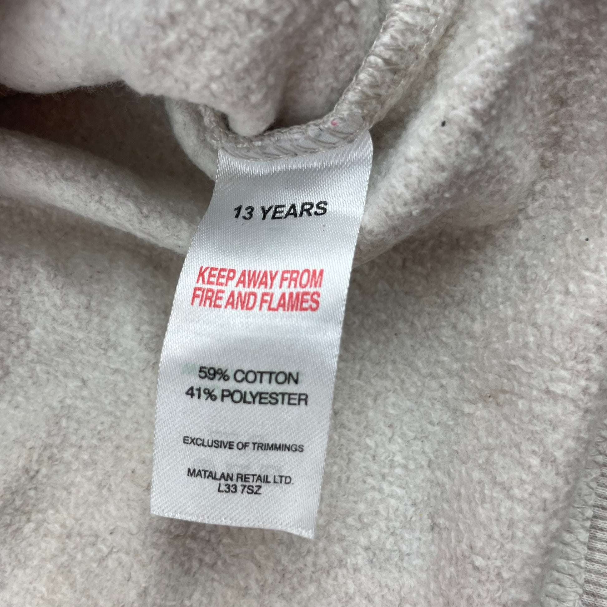 Graues Sweatshirt mit Leopardenmotiv und Schriftzug – label